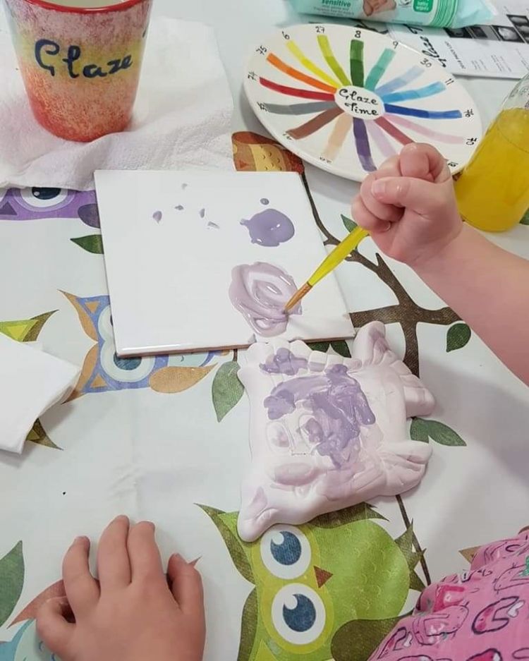 Summer holiday pottery painting session with Glaze Time